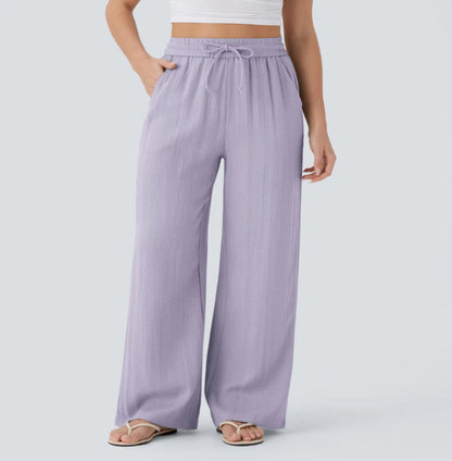 Pantalons larges et fluides à taille haute pour femme
