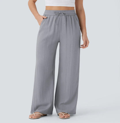Pantalons larges et fluides à taille haute pour femme