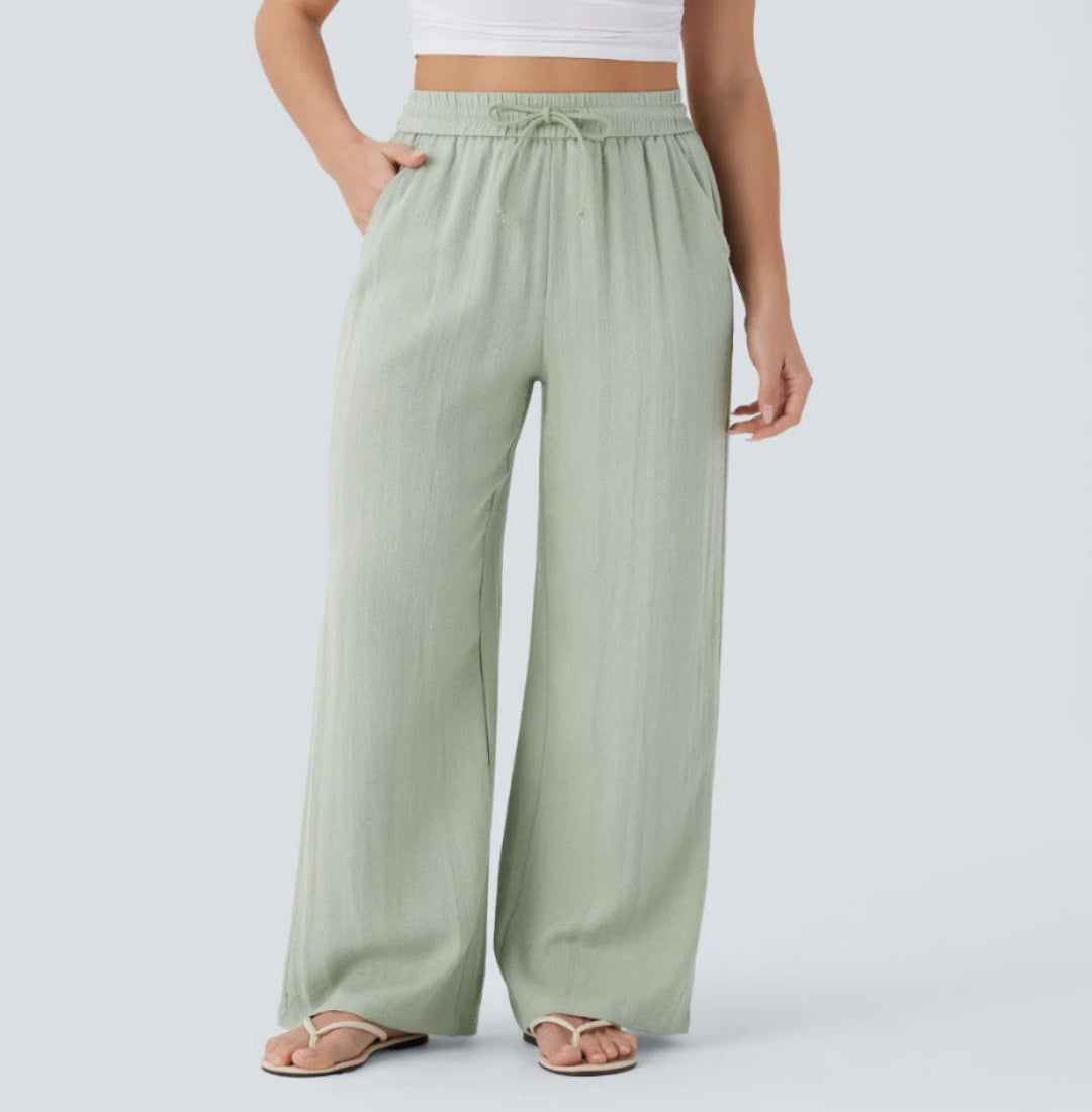 Pantalons larges et fluides à taille haute pour femme