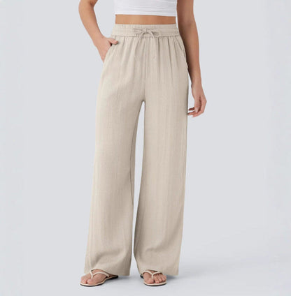 Pantalons larges et fluides à taille haute pour femme