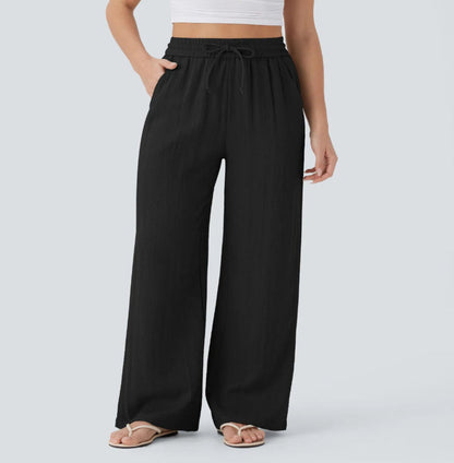Pantalons larges et fluides à taille haute pour femme